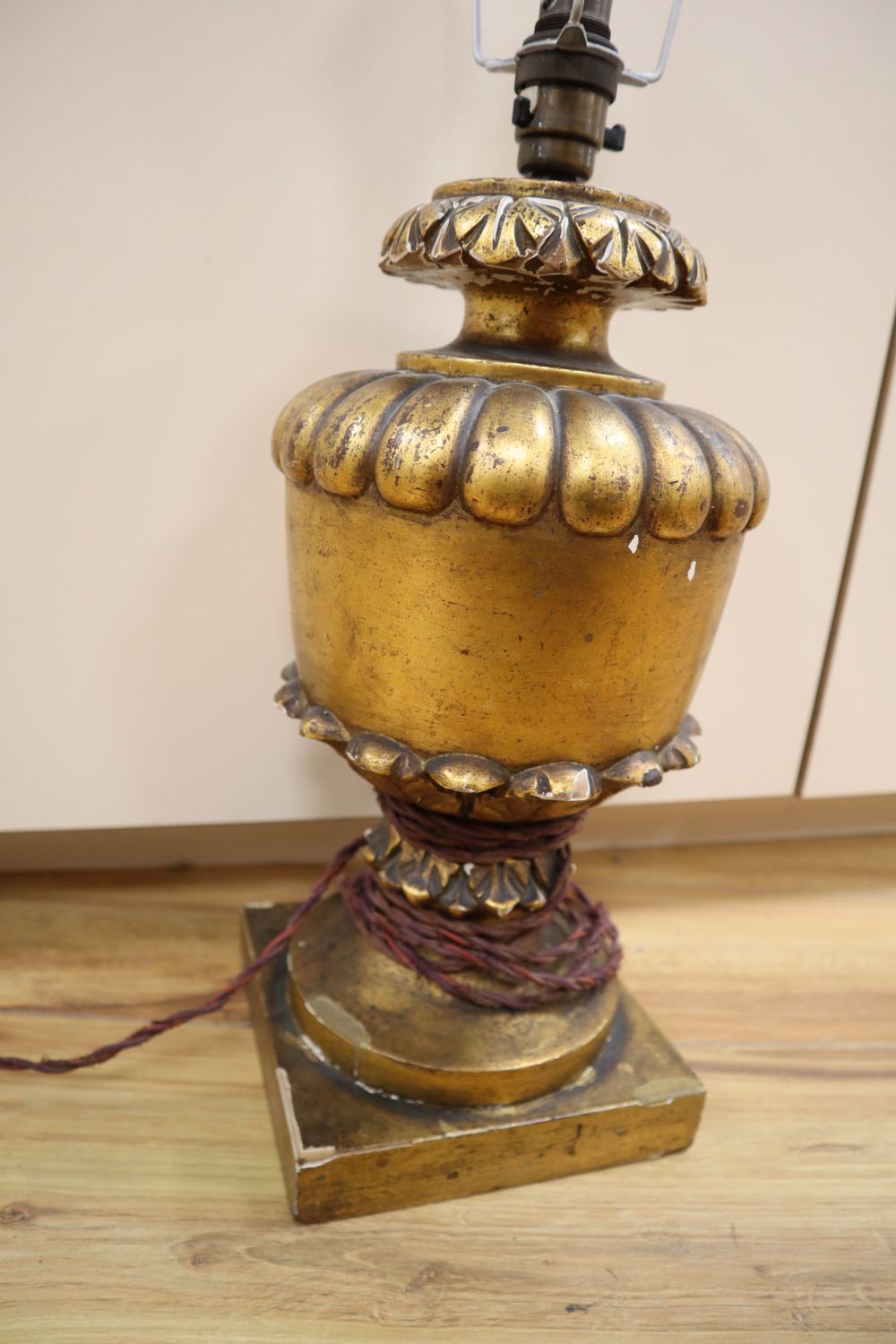 A gilt wood and composite table lamp, height 37cm